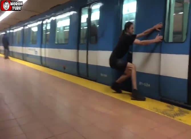 Video :A guy stops a metro train and restarts it with his arm power